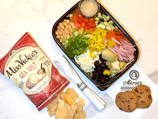 antipasto salad lunch box with chips and cookie