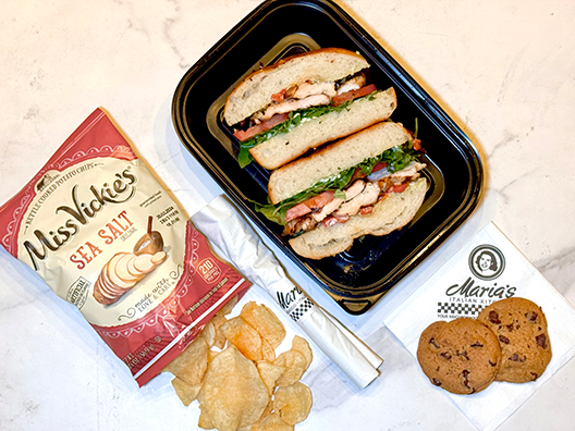 grilled chicken sandwich lunch box with chips and cookie